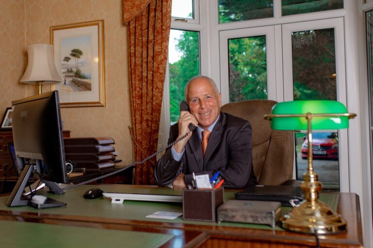 Accountant working at desk - Corporate Headshot Photography
