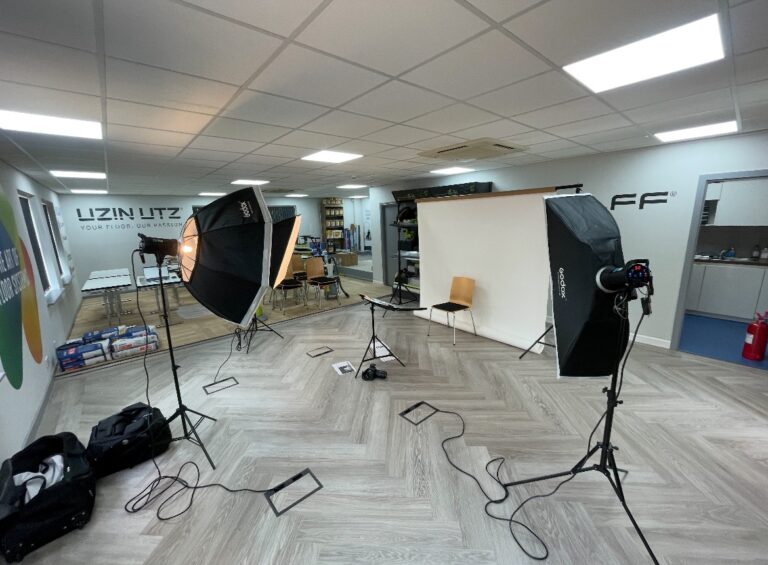 UzinUTZ Corporate Headshots Setup with backdrop, tripod lighting and facial light reflector. Emma Milestone